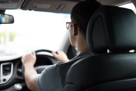 A focused male driver