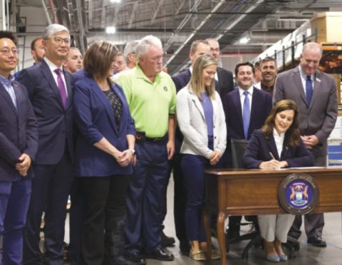 Gov. Whitmer signing an executive directive