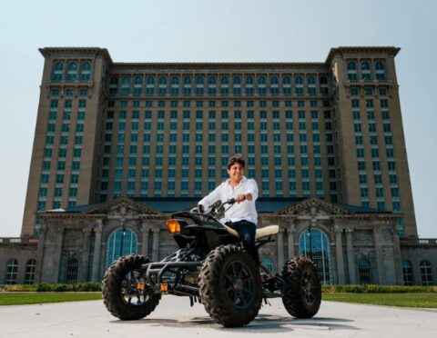 David Medina Álvarez posing in front of Michigan Central