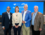 Sandy K. Baruah, Elissa Slotkin, Guy Gordon, and Glenn Stevens Jr. at a roundtable at the Detroit Regional Chamber.